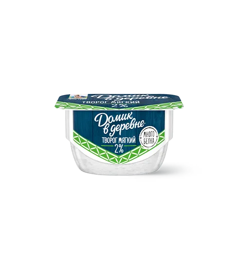 корова