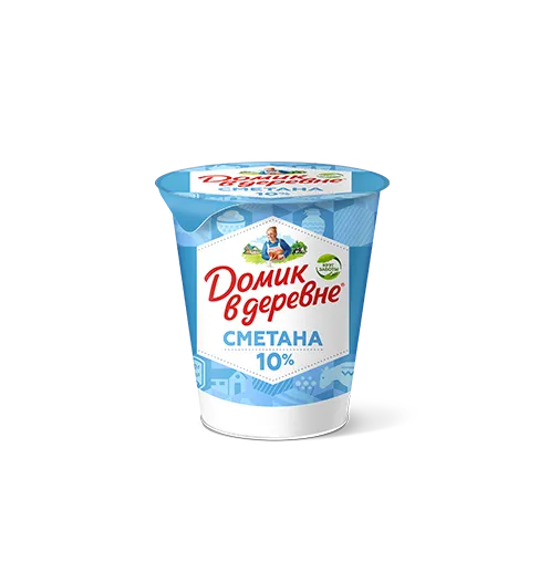 корова