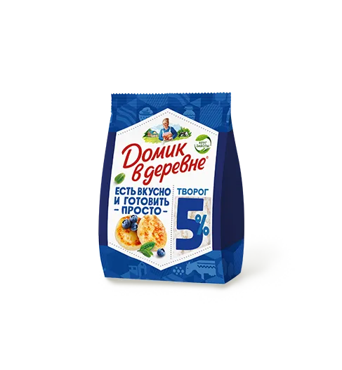 корова