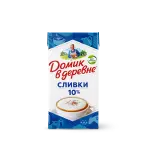 корова